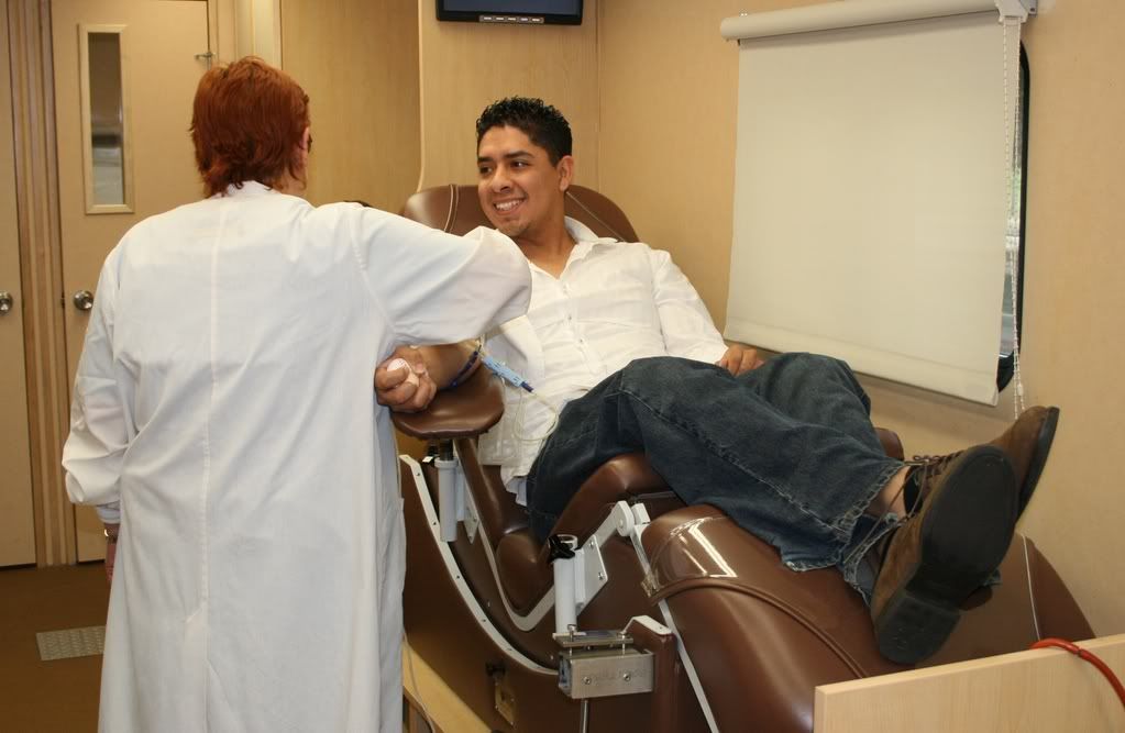 Oscar Mendez stops by to make his donation before visiting the Body Worlds Exhibit at the Houston Museum of Natural Science.