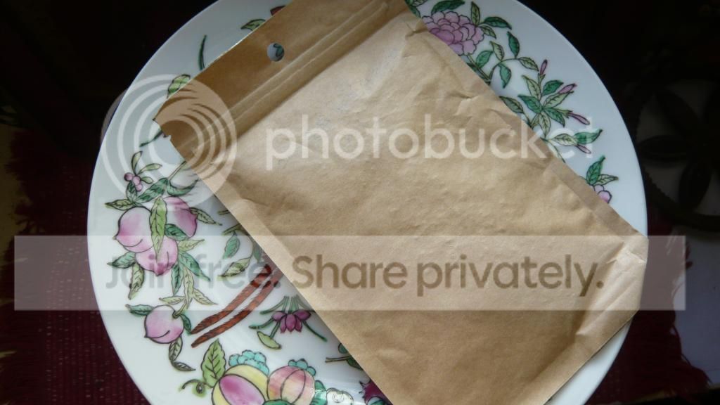 2003易武一砖一饼同料不同仓的对比